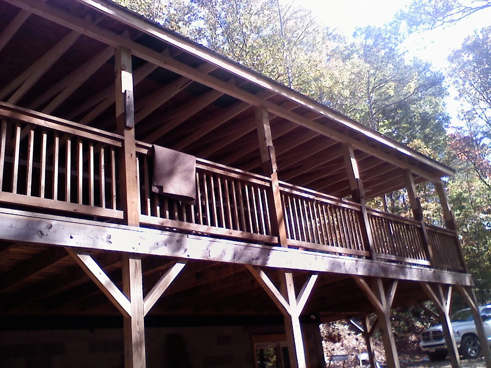 Timber framing under a new elevated porch and deck — Roof Leak Repair in Hoosick Falls by Roofing Brothers